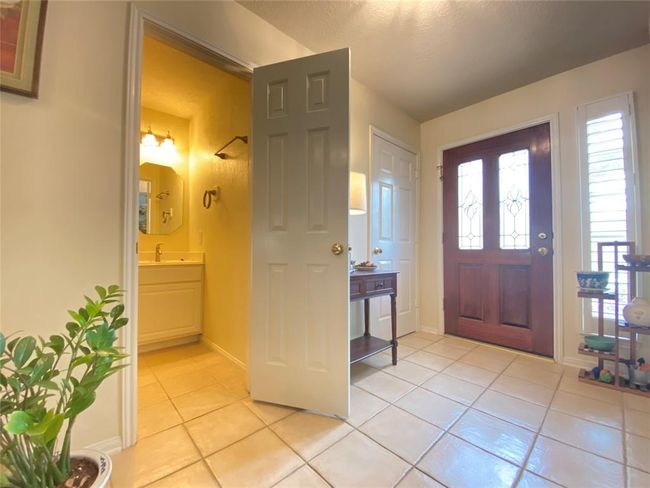 Downstair has a half bathroom. | Image 4