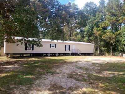 BACK MOBILE HOME IS 14X70 2 BEDROOM 2 BATH | Image 3