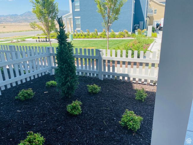 Fenced yard with a mountain view | Image 25