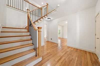 Stairs with hardwood / wood-style flooring | Image 3