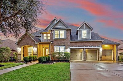 Welcome to this lovely 5-bedroom, 4-bathroom home in the desirable community of Fulbrook on Fulshear Creek. Featuring beautifully crafted spaces, a warm ambiance, and thoughtfully designed living areas, this residence offers an ideal setting for comfortable living. Discover the perfect place to call home. | Image 1