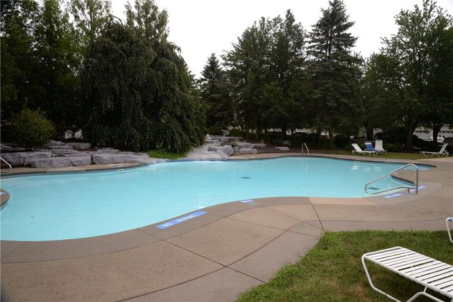 A community pool is just a few minutes walk away and is included in the HOA maintenance fee. | Image 37