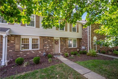 Mature landscaping and classic brick architecture | Image 2