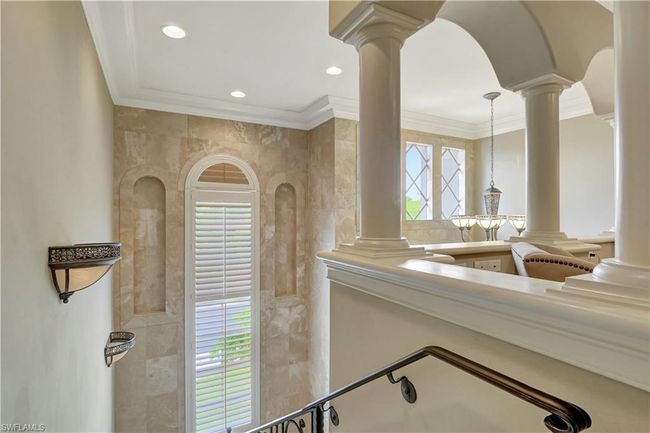 Bathroom with ornate columns, ornamental molding, and recessed lighting | Image 15