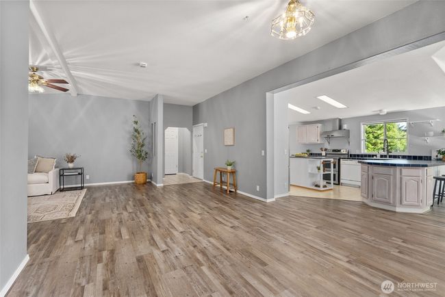 Great room leading into kitchen | Image 7