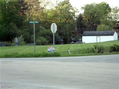 674 Rome Rock Creek Rd, Roaming Shores, OH, 44084-9717 | Card Image