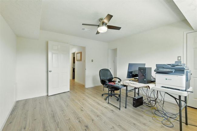 Another view of the fifth bedroom. | Image 31