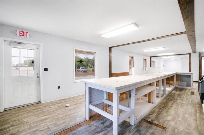 Cash register area with picture window overlooking parking lot | Image 8