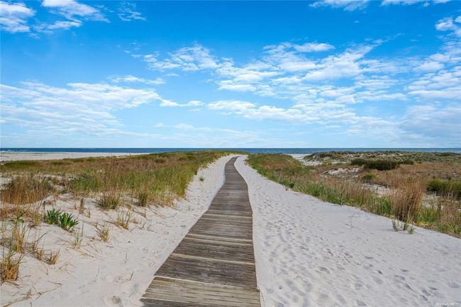 Surrounding community featuring a beach view and a water view | Image 21