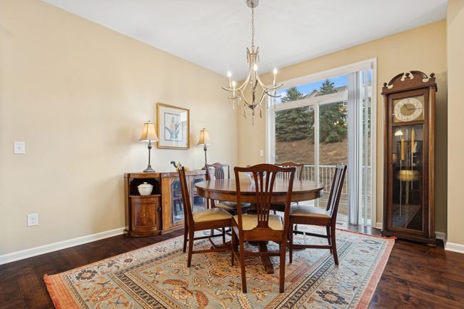 Sizable informal dining just off of the living room & kitchen. | Image 11