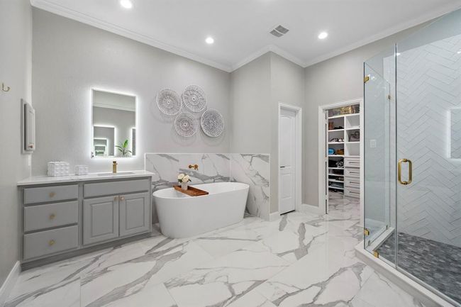 Start and end your day in your own spa-like retreat. Everything feature in this room is custom and updated with top-tier finishes. | Image 19