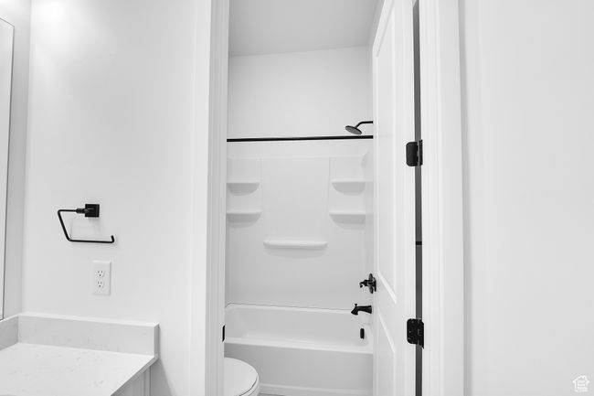 Full bathroom with toilet, shower / bath combination, and vanity | Image 19