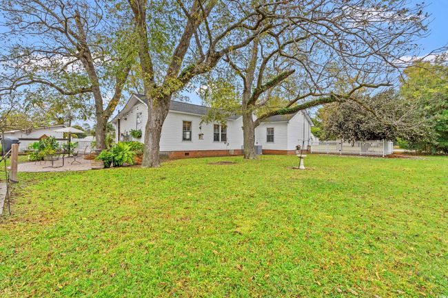 View of yard featuring a patio | Image 34