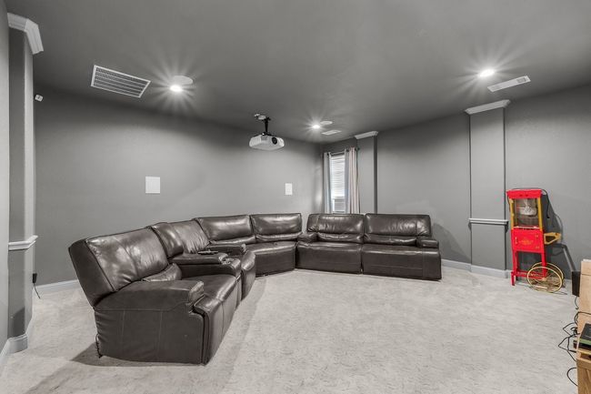 Carpeted home theater room featuring recessed lighting and baseboards | Image 31