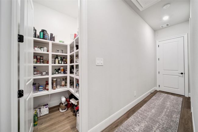 The large walk in pantry. | Image 18
