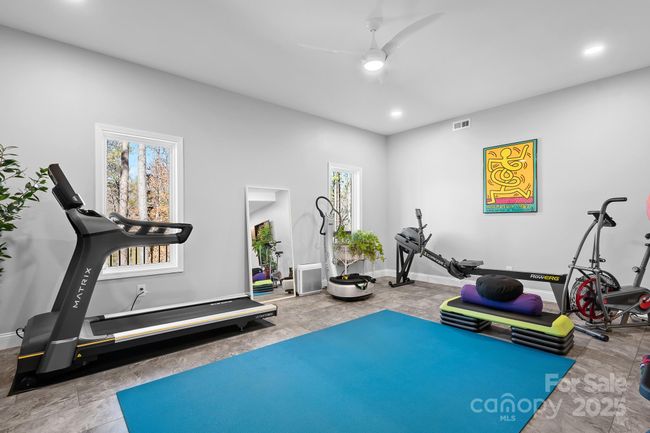Lower level/basement finished space with tons of options for entertainment, gym, office space etc. | Image 27
