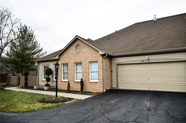 Two-stall garage with additional parking area | Image 4
