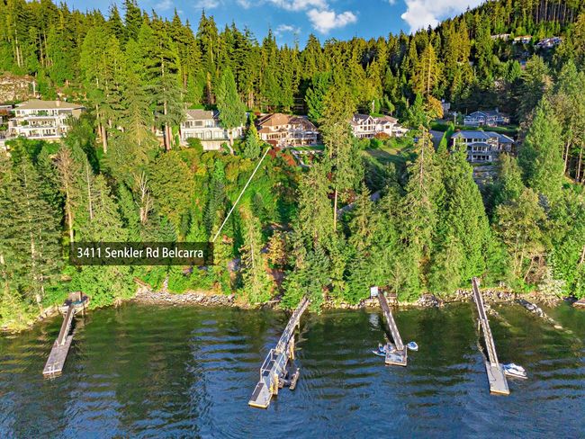 Aerial view with a wooded view and a water view | Image 37