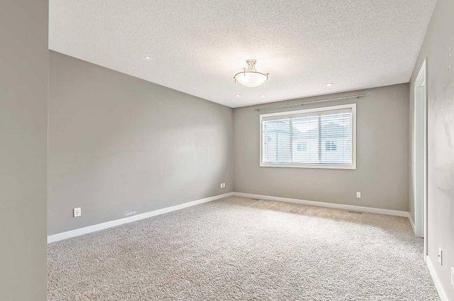 915 Windsong Drive, Home with 3 bedrooms, 2 bathrooms and 3 parking in Airdrie AB | Image 16