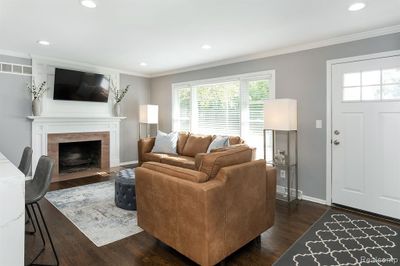 Living room with natural fireplace | Image 3