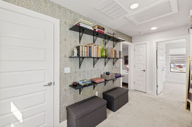 Office space featuring visible vents, baseboards, wallpapered walls, recessed lighting, and light colored carpet | Image 17