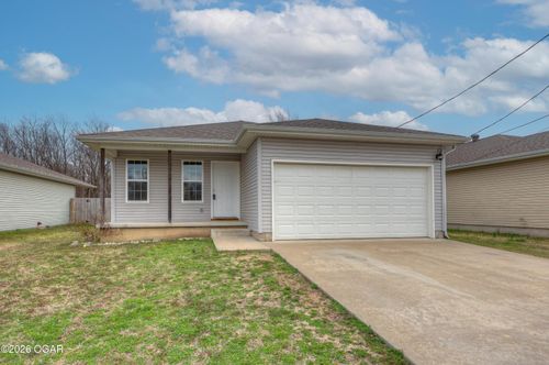 609 S Arch St, Carterville, MO, 64835-1705 | Card Image