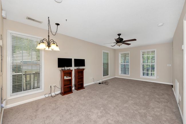 Living Room- carpet, ceiling fan | Image 6