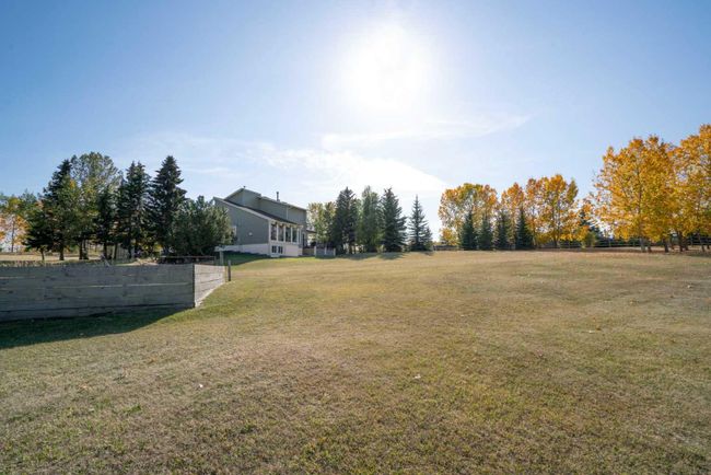 28 Poplar Hill Place, Home with 4 bedrooms, 3 bathrooms and 6 parking in Rural Rocky View County AB | Image 40