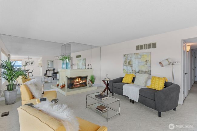 Cozy up with a good book next to the wood burning fireplace. | Image 9