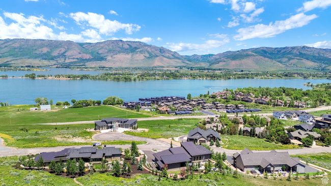 Aerial view of residential area with a water and mountain view | Image 112