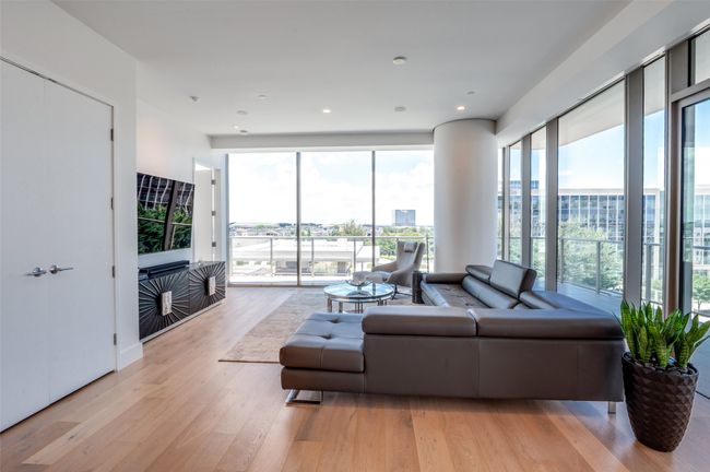 Living area featuring light wood-style floors and recessed lighting | Image 14