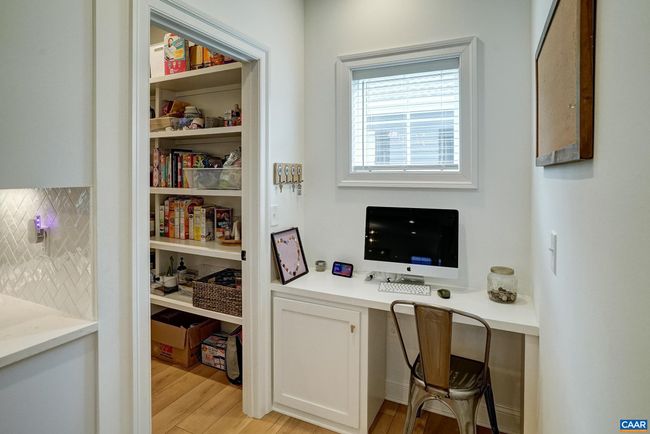 Built-in desk/charging area. | Image 23