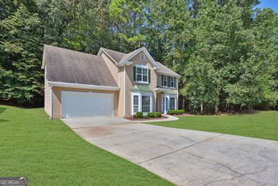 6951 Wind Run Way, House other with 4 bedrooms, 2 bathrooms and 6 parking in Stone Mountain GA | Image 2