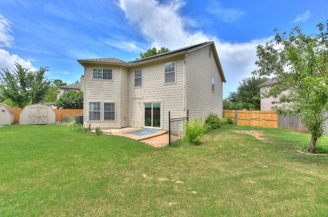 Back patio area and another look at this huge .33 acre pie shaped lot! | Image 33