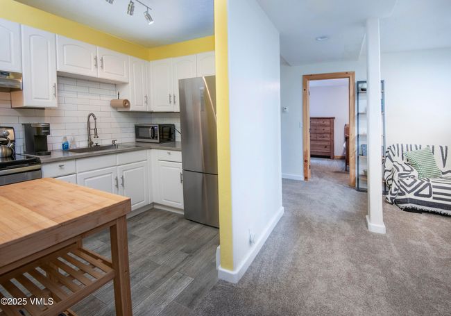 Lower level kitchen and living room | Image 30