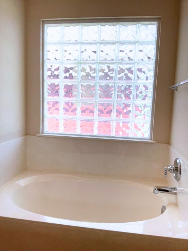 Bathroom featuring a soaking bath | Image 26