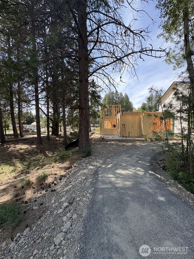 As the newest PNW master-planned community, enjoy 200+ acres of open space, trails & the Coal Trax Mt Bike Park. Soaring ceilings in the great roommake each day worthy of celebration & open floorplan appeals to entertaining. Covered deck & patio. Southern-facing homesites range from the mid600s- 900ks. Enjoy a variety of innovative & distinctive new home options with the best all-season recreation just moments away! Built for the future, indulge in a retreat just 90-min to Seattle. Plans and elevations are artist’s renderings only, may not accurately represent the actual condition of a home asconstructed and may also contain options and upgrades which are not included in the sale. Trailside Homes reserves the right to make changes to the floorplan, specifications, dimensions, design and elevations without prior notice. Stated dimensions and square footage are estimated and should not be usedas representations of the home’s actual size. | Image 6