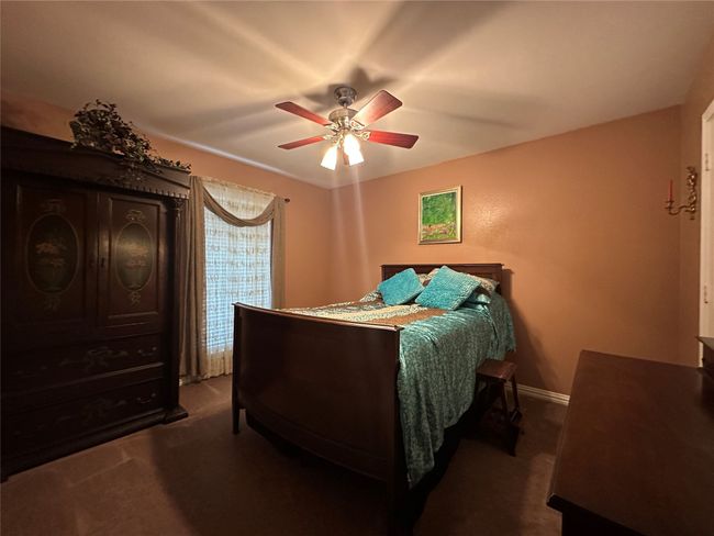 Carpeted bedroom with baseboards and ceiling fan | Image 20