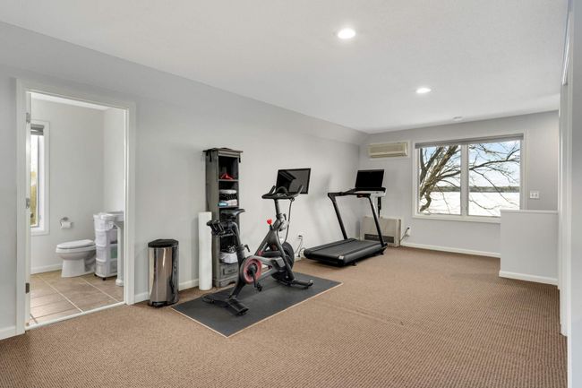Space above the garage - bathroom, heat and AC! Has a great lake view too! | Image 41