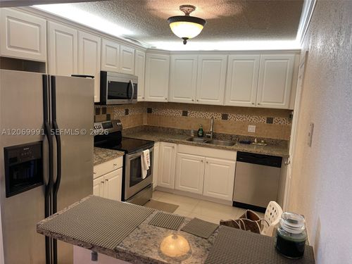f2-111 Golden Isles Dr, Hallandale Beach, FL, 33009-5822 | Card Image
