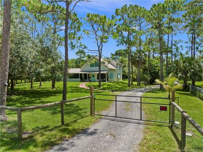 15208 101st Trail N, House other with 4 bedrooms, 3 bathrooms and 2 parking in Jupiter FL | Image 2