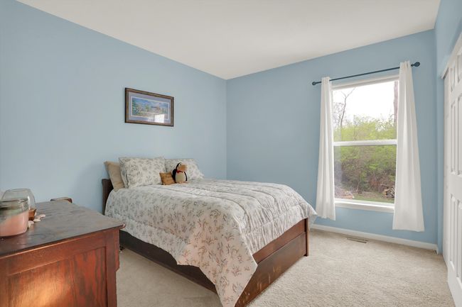 Guest Bedroom on Main Level has Window Overlooking Private Backyard! | Image 36