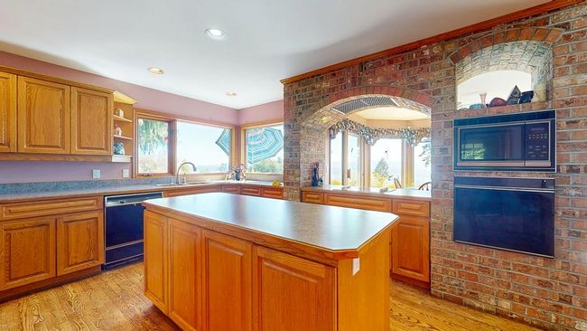 Kitchen featuring a center island | Image 13