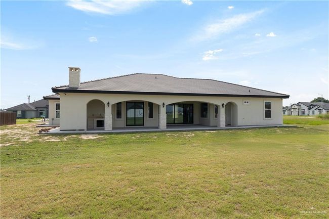 Set on a generous half-acre lot, this home offers space, sophistication, and seamless control at your fingertips or by simple voice command. | Image 40