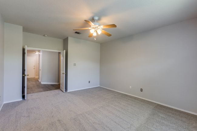 Master bedroom ceiling fan and baseboards | Image 29