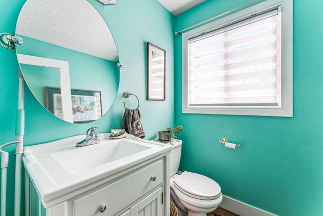 718 Queenston Terrace Se, Home with 2 bedrooms, 1 bathrooms and 2 parking in Calgary AB | Image 11