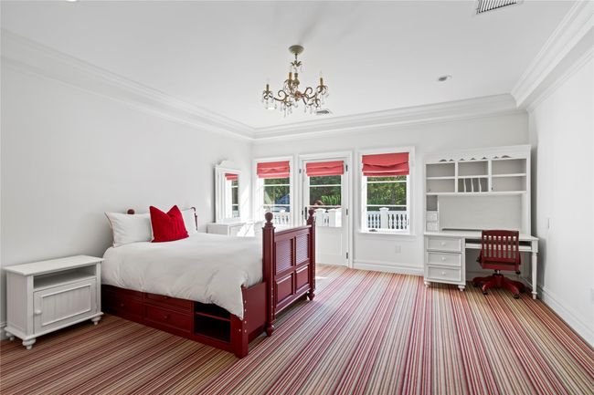 Bathroom featuring crown molding, vanity, and an enclosed shower | Image 23