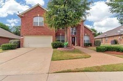 View of front of home with a garage | Image 1