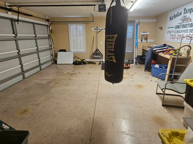 Garage featuring a garage door opener | Image 21