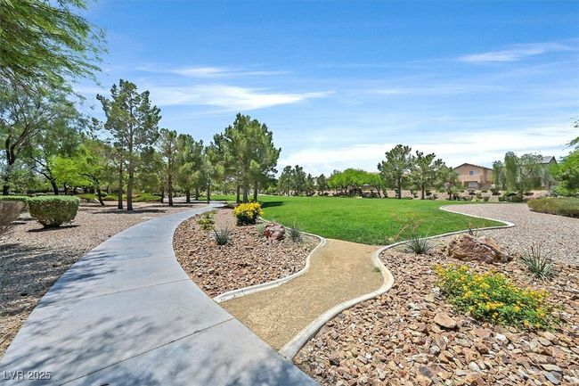 View of home's community with a yard | Image 24